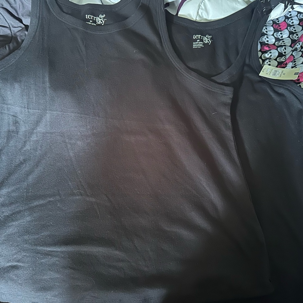 Terra and sky tanks tops
